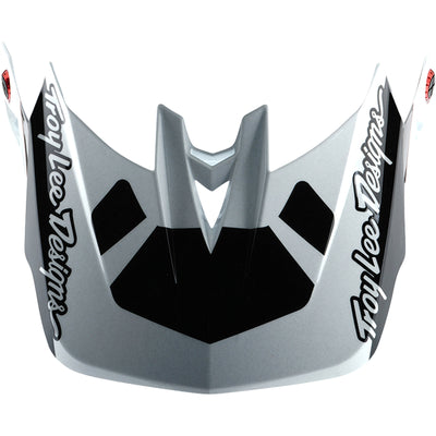 Helmet visor with Troy Lee Designs branding on a white background