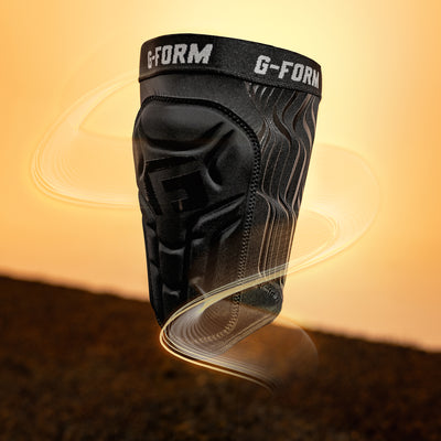 Black G-Form knee pad on a blurred background